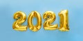 2021 golden balloon text on blue background. Happy New year eve invitation with Christmas gold foil balloons 2021. Long web banner Royalty Free Stock Photo