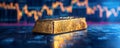 Golden bar resting amid detailed stock exchange chart.
