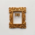 A golden Baroque frame in and a royal crown on a white background. Royalty Free Stock Photo