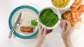 Golden batter deep fried fish fillet, served with green peas, sweet corn, and slices of lemon Royalty Free Stock Photo