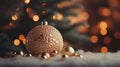 Golden baubles on glistening christmas tree with sparkling lights, festive and magical ambiance