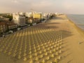 Jesolo in a aerialial panoramic view on blue sea - golden beach and sea with back city