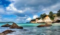 The golden sandy beach and stunning rock formations and archway at Cathedral cove in the Coromand