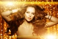 Golden beautiful fashion woman, model with shiny healthy long v Royalty Free Stock Photo