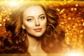 Golden beautiful fashion woman, model with shiny healthy long v Royalty Free Stock Photo