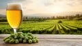 Golden beer with hops, a refreshing brew on rustic wooden table refreshing Royalty Free Stock Photo