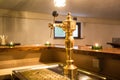 Golden beer tap in empty bar Royalty Free Stock Photo