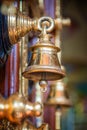 Golden bell, detail of the door of Sri Veeramakaliamman Temple in Singapore