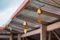 A golden bell hanging under the Thai temple roof Royalty Free Stock Photo