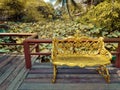 Golden bench background is lotus pond Royalty Free Stock Photo