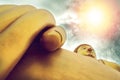 Golden big buddha statue witn sunlight in sky Royalty Free Stock Photo