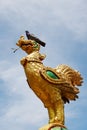 Golden Bird statue in Wat Plai Laem temple in Sumi island