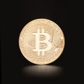 Golden bitcoin on black background, clipping path