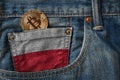 Golden BITCOIN & x28;BTC& x29; cryptocurrency in the pocket of jeans with Royalty Free Stock Photo