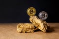 Gold and silver Bitcoin Coins balances on natural stones on dark background. Blockchain cryptocurrency, store of value