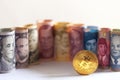 Golden Bitcoin and banknotes
