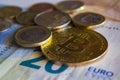 Golden bitcoin coin and euro money Royalty Free Stock Photo