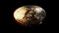 Golden bitcoin coin highlighted with sharp dramatic lighting Royalty Free Stock Photo