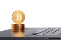 Golden Bitcoin coin on the laptop keyboard. Internet stock. Trad Royalty Free Stock Photo
