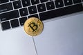 One Golden bitcoin coin on laptop keyboard Royalty Free Stock Photo