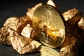 Golden Bitcoin Coin and mound of gold. Bitcoin cryptocurrency. Royalty Free Stock Photo