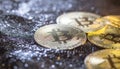 Golden Bitcoin Coins on Glittering Dark Surface with Sparkling Light Reflection Royalty Free Stock Photo
