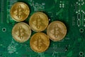 Golden Bitcoin Cryptocurrency On Computer Circuit Board CPU Royalty Free Stock Photo