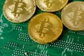 Golden Bitcoin Cryptocurrency On Computer Circuit Board CPU Royalty Free Stock Photo