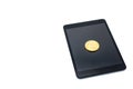 Golden bitcoin digital currency on blank screen digital tablet. Electronic money exchange concept, Royalty Free Stock Photo