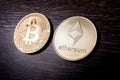 Bitcoin and Ethereum on a dark wooden surface