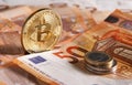 Golden bitcoin on fifty euro banknotes background. Bitcoin crypto currency, Blockchain technology, digital money, Mining concept, Royalty Free Stock Photo