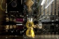 Golden bitcoin in front of a motherboard Royalty Free Stock Photo