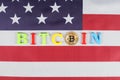 Golden bitcoin, inscription bitcoin on the flag of the United States