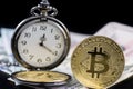 Golden bitcoin and pocket watch near on us dollars Royalty Free Stock Photo