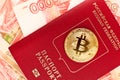 Golden bitcoin on russian passport