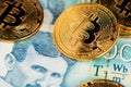 Golden Bitcoin with Serbian banknotes. Portrait of scientist Nikola Tesla.