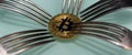 Golden bitcoin and silver forks around Royalty Free Stock Photo