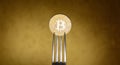 Golden bitcoin in siver fork on abstract background Royalty Free Stock Photo