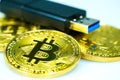 Golden bitcoin and USB flash drive Royalty Free Stock Photo