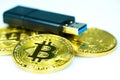Golden bitcoin and USB flash drive Royalty Free Stock Photo