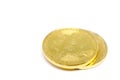 Golden Bitcoin on white background