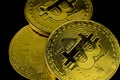 Golden bitcoins on black background Royalty Free Stock Photo