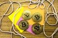 Golden bitcoins on wooden desk, cryptocurrency background with paper notes.3D illustration Royalty Free Stock Photo