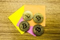 Golden bitcoins on wooden desk, cryptocurrency background with paper notes.3D illustration Royalty Free Stock Photo