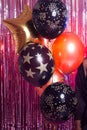 Golden and black balloons. The photo zone is decorated with black and yellow balloon. Stylish party with balloons Royalty Free Stock Photo