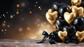 Golden and black metallic balloons on blurred background for festive celebrations and events.