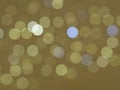 Golden and blue bokeh lights circles on beige gold background ab
