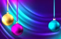 Golden, blue, pink hanging Christmas balls on purple background