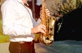 Golden Blues. Boys Band saxophone section at event , jazz player male playing on Saxophone, music instrument played by man saxopho Royalty Free Stock Photo