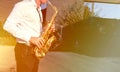 Golden Blues. Boys Band saxophone section at event , jazz player male playing on Saxophone, music instrument played by man saxopho Royalty Free Stock Photo